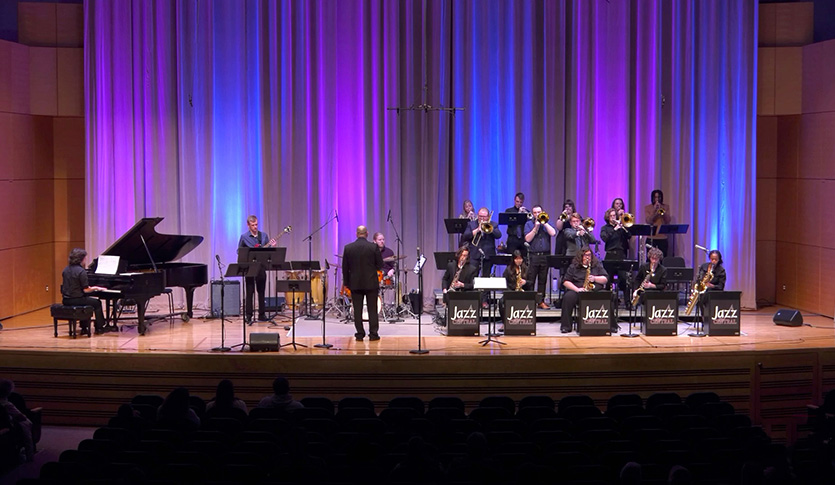 A picture of the CMU Jazz Central performing in Staples Family Concert Hall under the direction of Professor Robbie Smith.