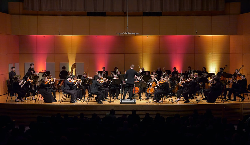The CMU Symphony Orchestra performing in Staples Family Concert Hall.