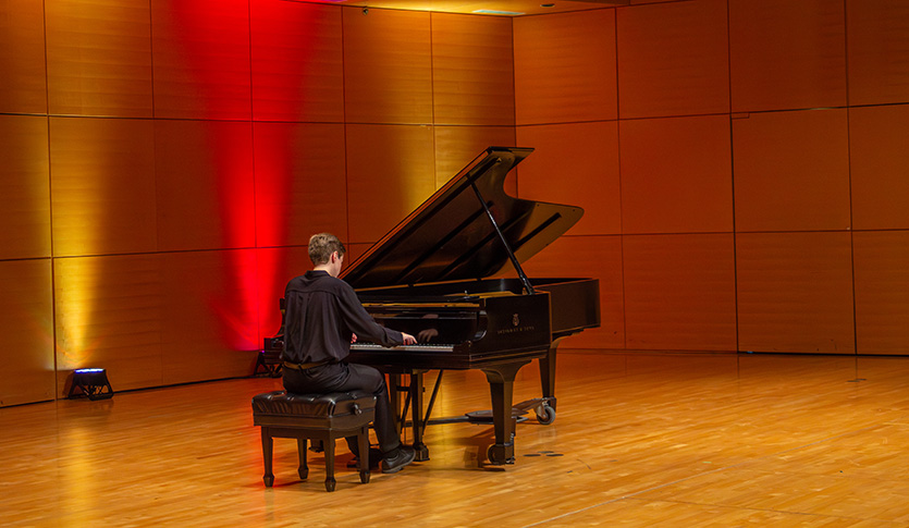 A pianist playing in Staples Family Concert Hall.