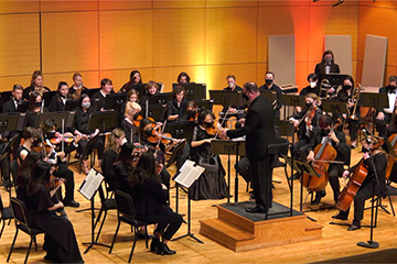 A picture of the CMU Symphony Orchestra under the direction of Dr. Christopher Chapman