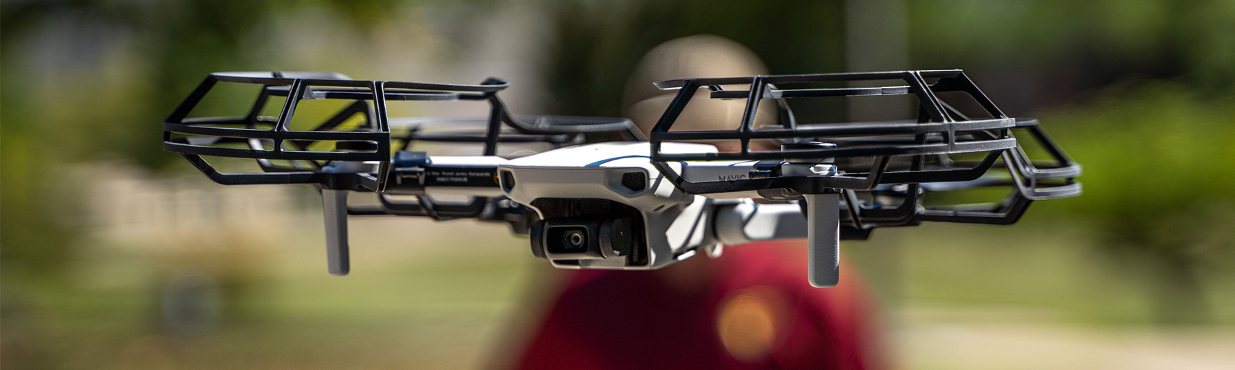 Close-up of a student flying a drone