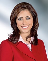 Headshot of Catherine Bodak with a soft blue backdrop.