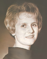 Headshot of Cheerie Anderson, a greyscale image cut from a newspaper.