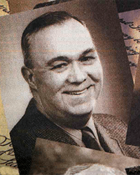 Headshot of James Stanford Bradshaw, a greyscale image cut from a newspaper