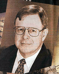 Headshot of JimWojcik, a greyscale image cut from a newspaper