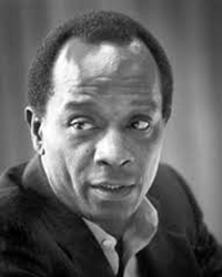 Headshot of Lem Tucker, a greyscale image