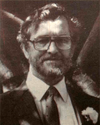 Headshot of Thomas R Rood, a greyscale newspaper clipping