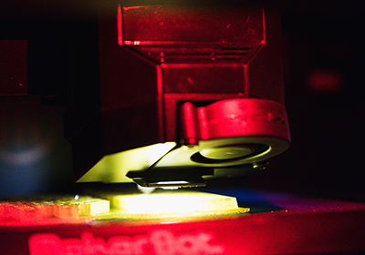 A close up on the mechanics of the MakerBot 3D printer.