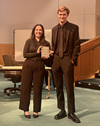Open Public Forum National Champions: Senior Teagan K. and Junior Mason P. accepting their award