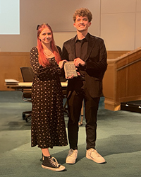 Novice Public Forum National Champions: Sophomore Sapphire C. and Freshman James B. accepting their award