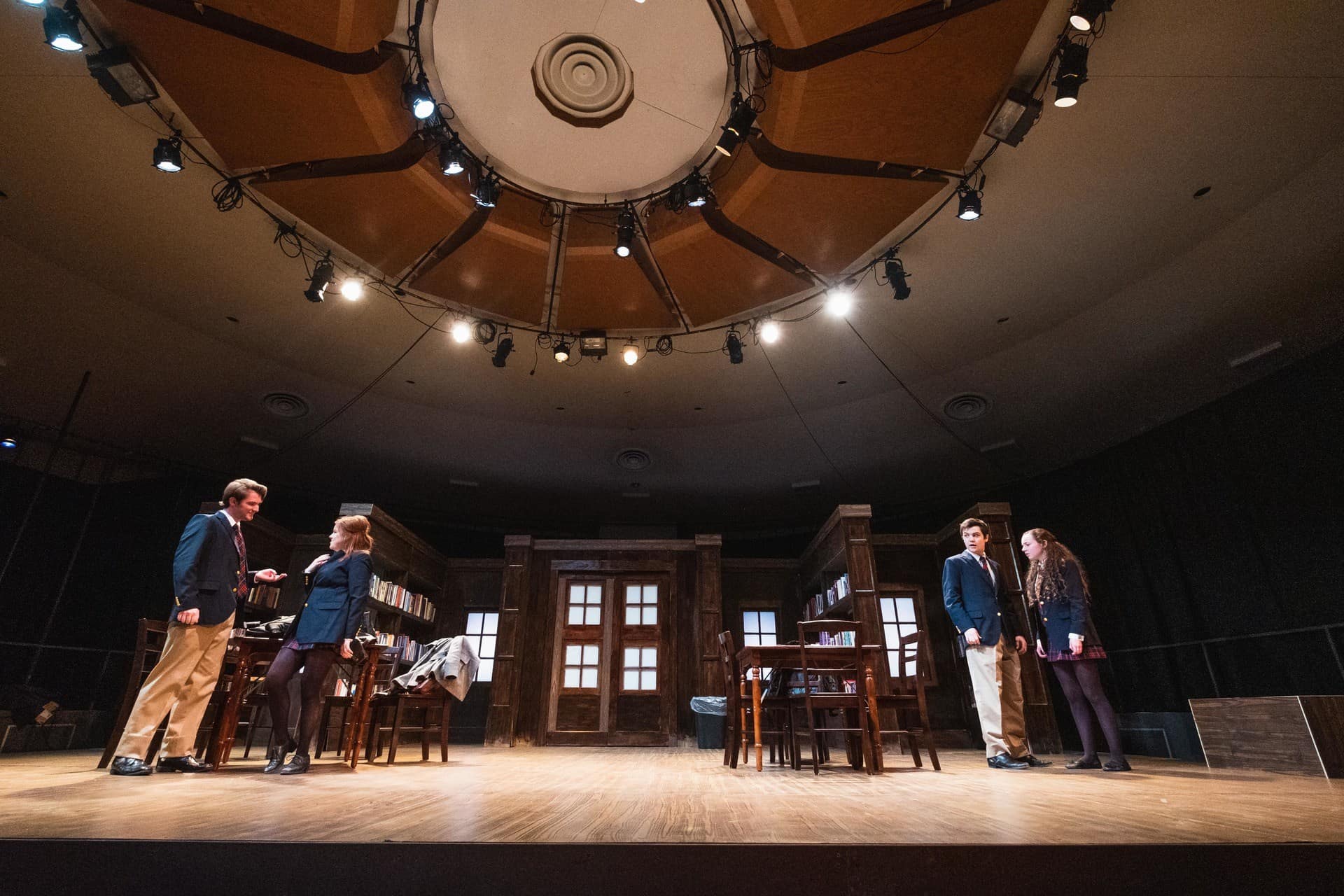 Four students up the Bush Theatre stage on Central Michigan University's campus while they do a Punk Rock performance.