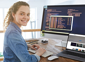 Young woman sitting at a computer