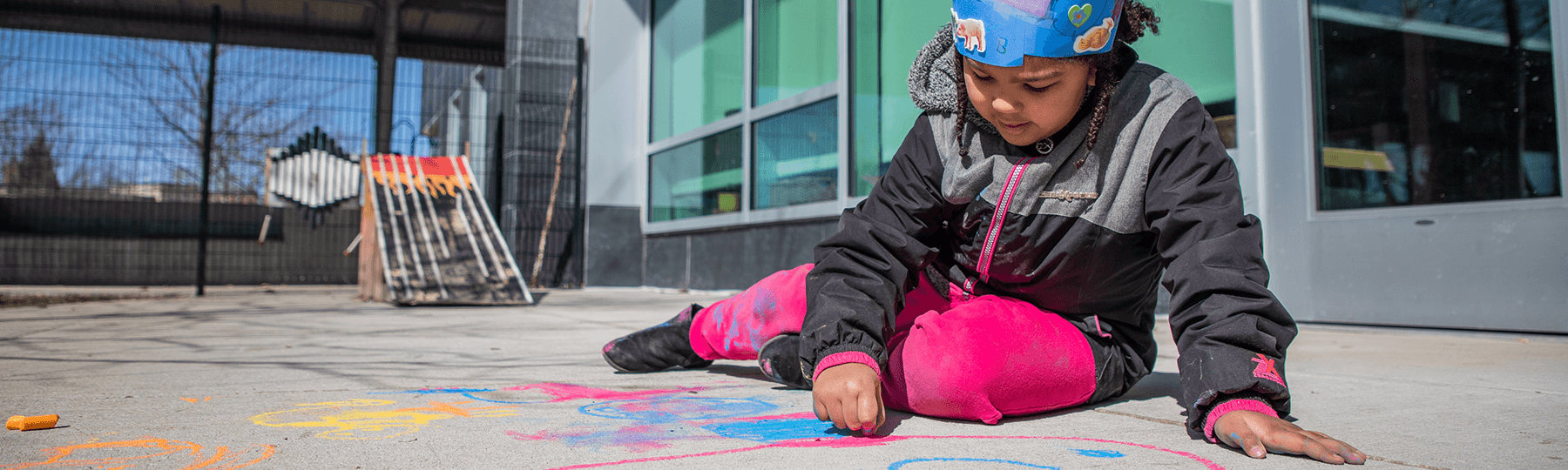 child development learning laboratory girl drawing with chalk