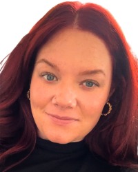 Caitlin Miller smiling at camera.