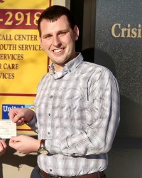 Nicholas Goike smiling and posing for a photo.