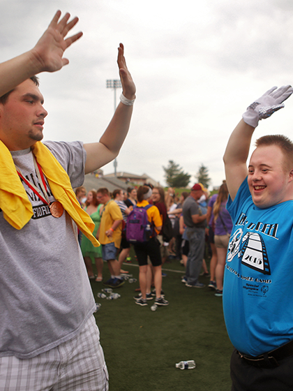 Special olympics high five