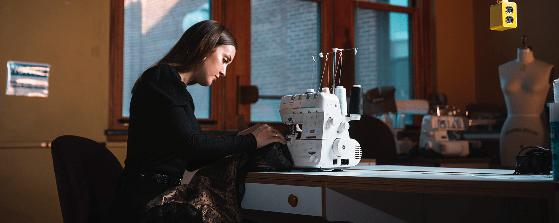 student sewing