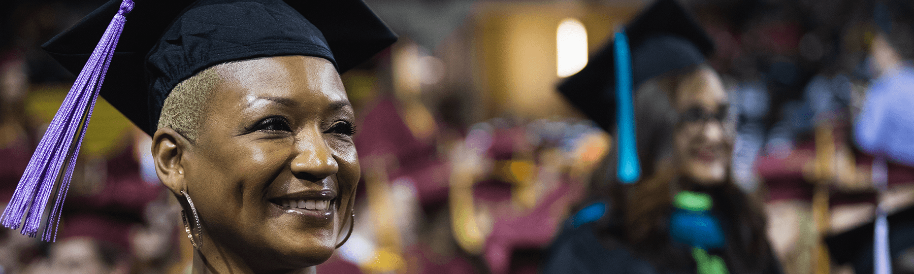 CMU graduation graduate in cap and gown
