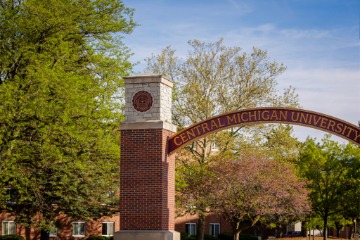 The CMU archway with trees behind it.