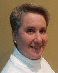 Tammy Kolski DET graduate Tammy Kolski a graduate from the Doctorate in Educational Technology program at Central Michigan University in a white turtle neck.