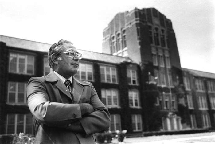 Former Central Michigan University President Harold Abel stands near Warriner Hall.