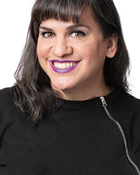 Closeup image of Kathleen Mercury wearing a black shirt