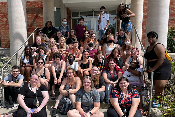 Students from the Public Service Residential College on the steps of Anspach Hall.
