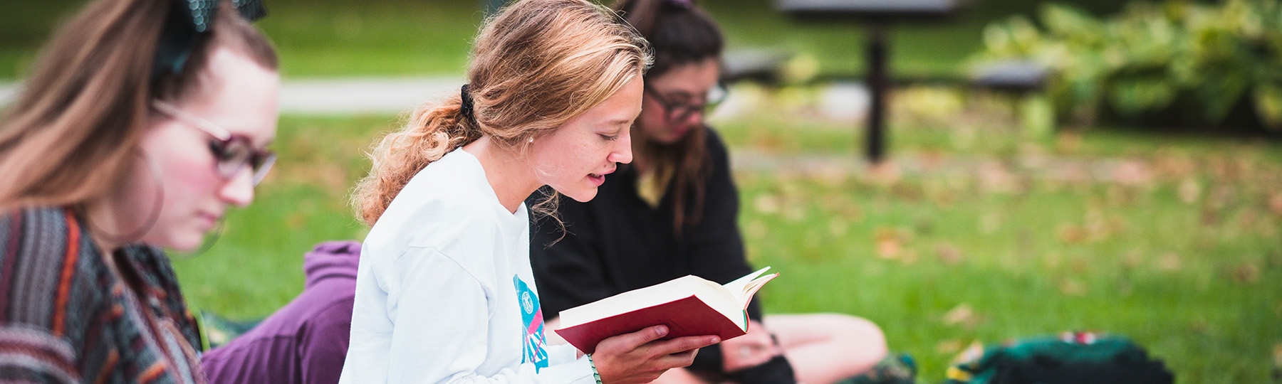 Students attend the Leaves of Grass marathon reading next to Park Library