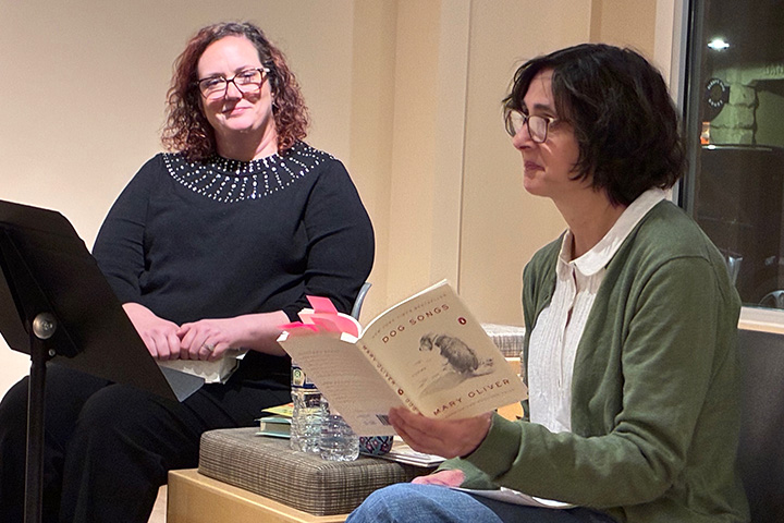 Nicole Sparling-Barco (left) and Gretchen Papazian (right) seated next to each other holding books.