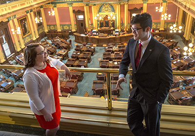 Student interns stand in the Michigan State Capitol