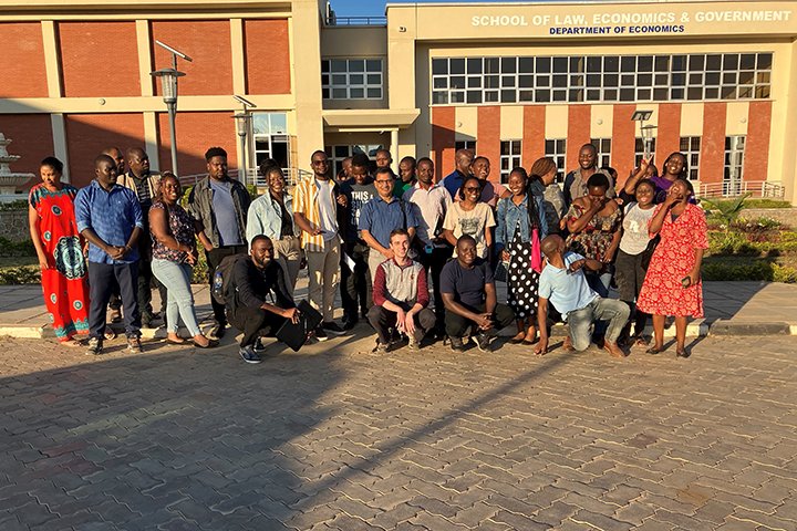 Professor Prakash Adhikari (center, wearing blue shirt and glasses) and CMU student Brady Whalen (front row center, wearing CMU sweatshirt) with graduate students at the University of Malawi.