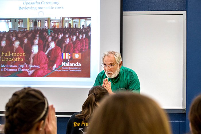 Students attend class with Dr. Talat Halman