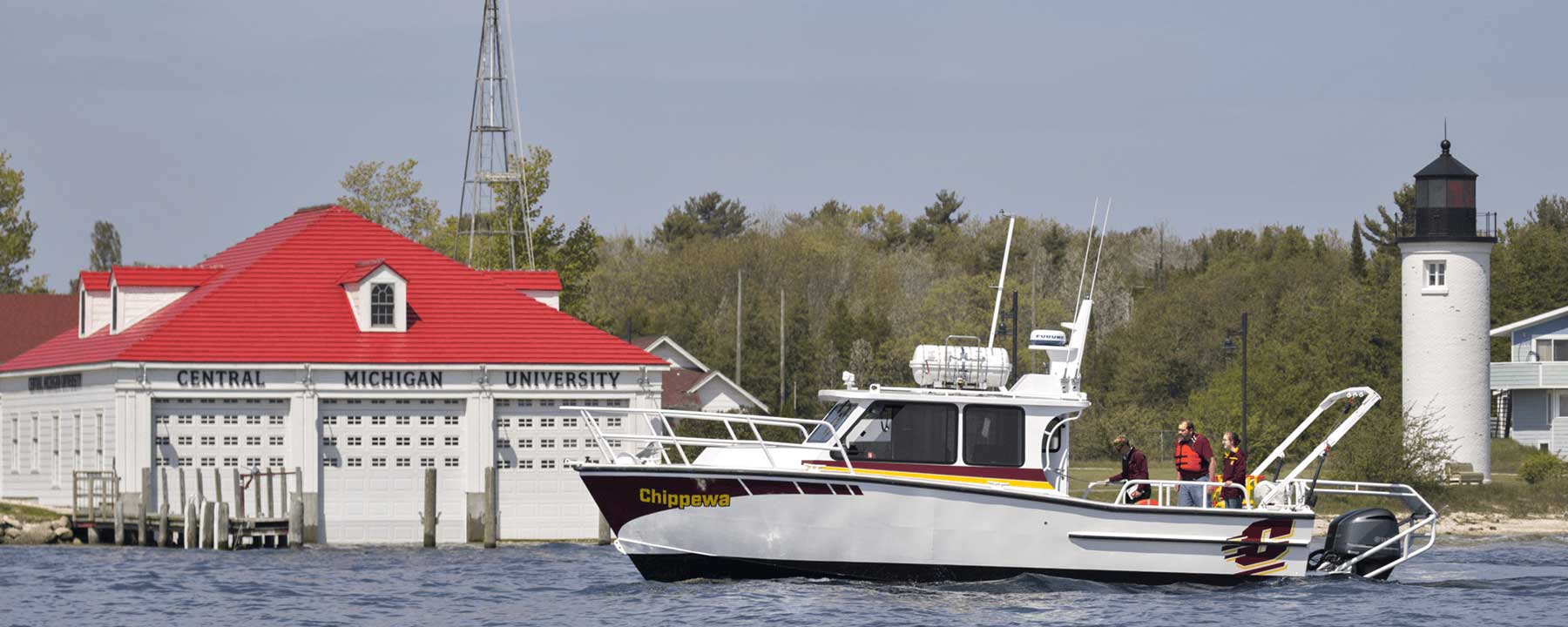 The MV Chippewa in the water in front of the CMU Boathouse.