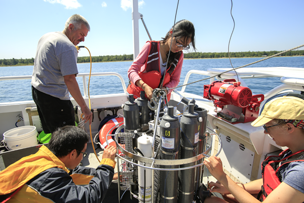 Students preparing sampling equipment aboard the MV Chippewa