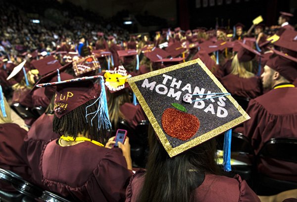 Student in caps and gowns at graduation