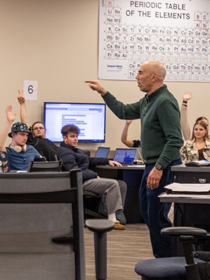 CMU faculty member leading a discussion in an active learning classroom.