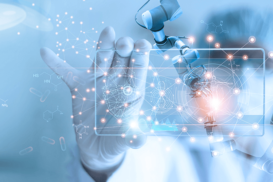 A gloved hand holds a screen with molecules displayed on it.