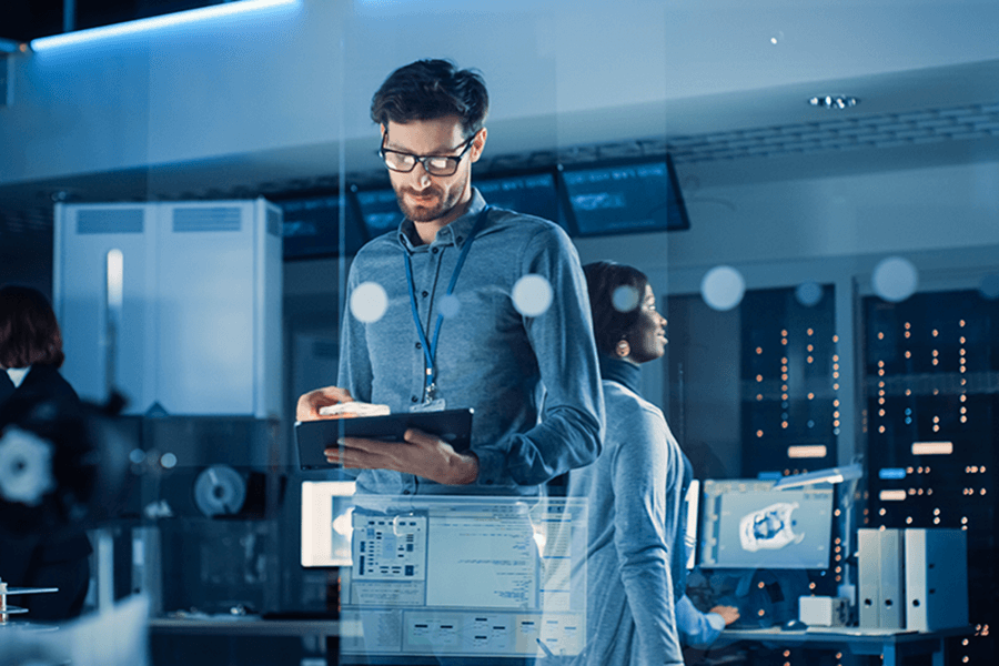 A computer engineer checks his work.