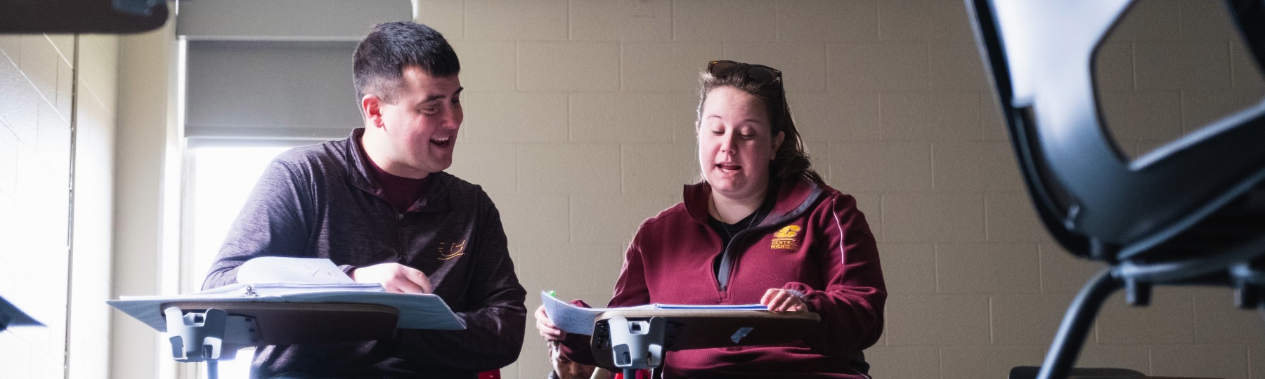 Two graduate math students discuss their coursework