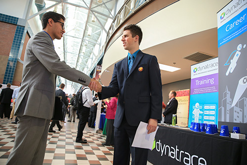 Two men shaking hands.