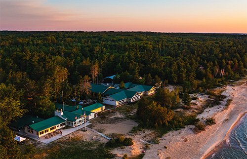 An aerial view of the CMU Biological Station on the shore of Lake Michigan.