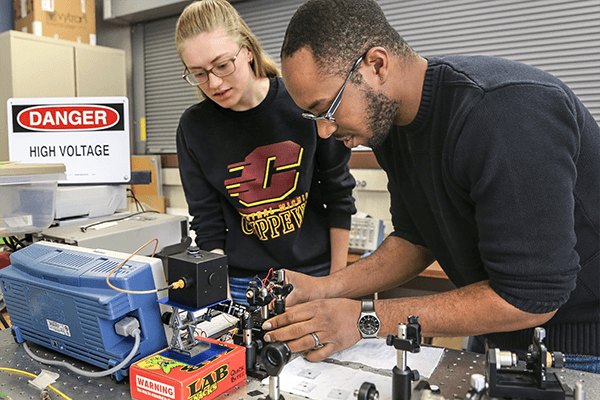 Electrical Engineering students conducting experiment.