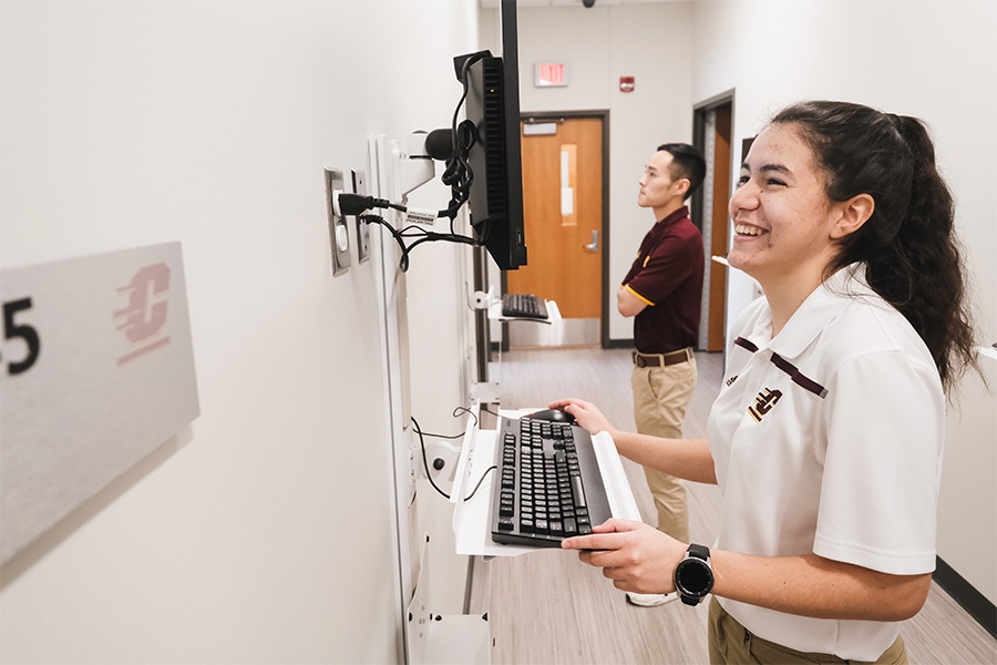 Athletic Training student entering data into a computer