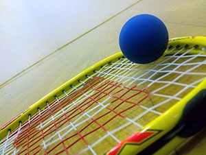 Racquet and racquet ball
