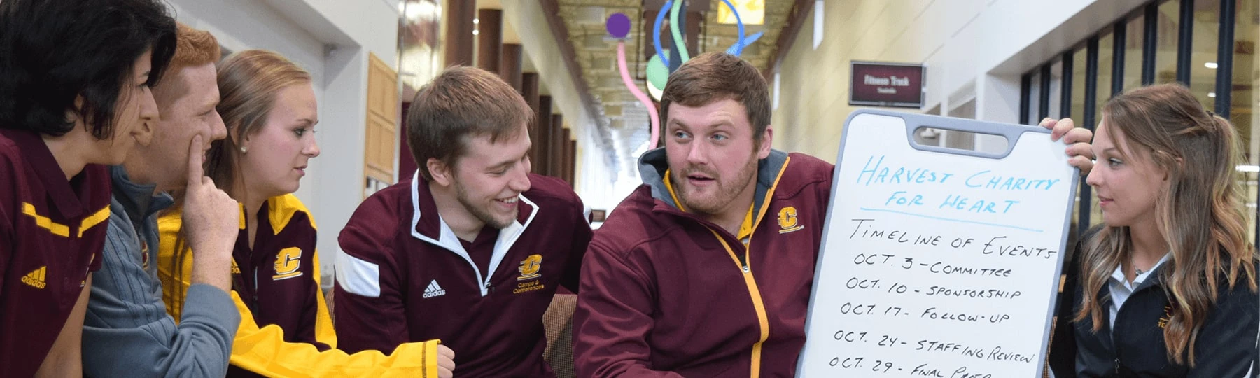 Students sitting discussing an event