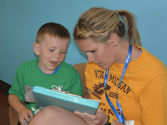 Student reading to a child