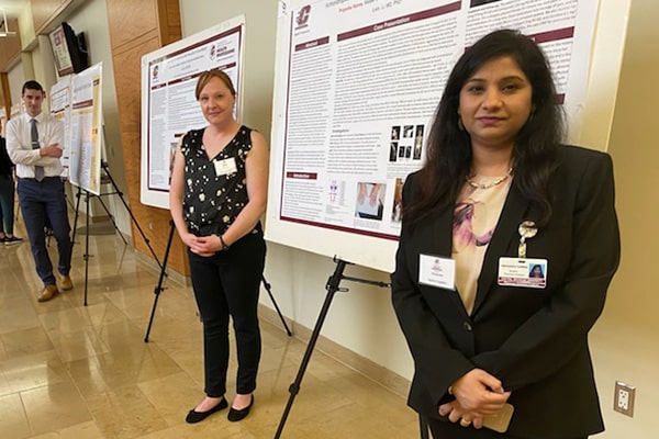 Physician Assistant students presenting their case studies at the annual PA student research symposium.