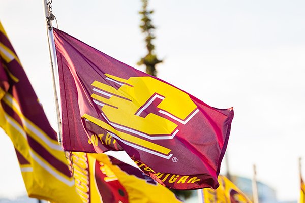 Several unfurled CMU flags