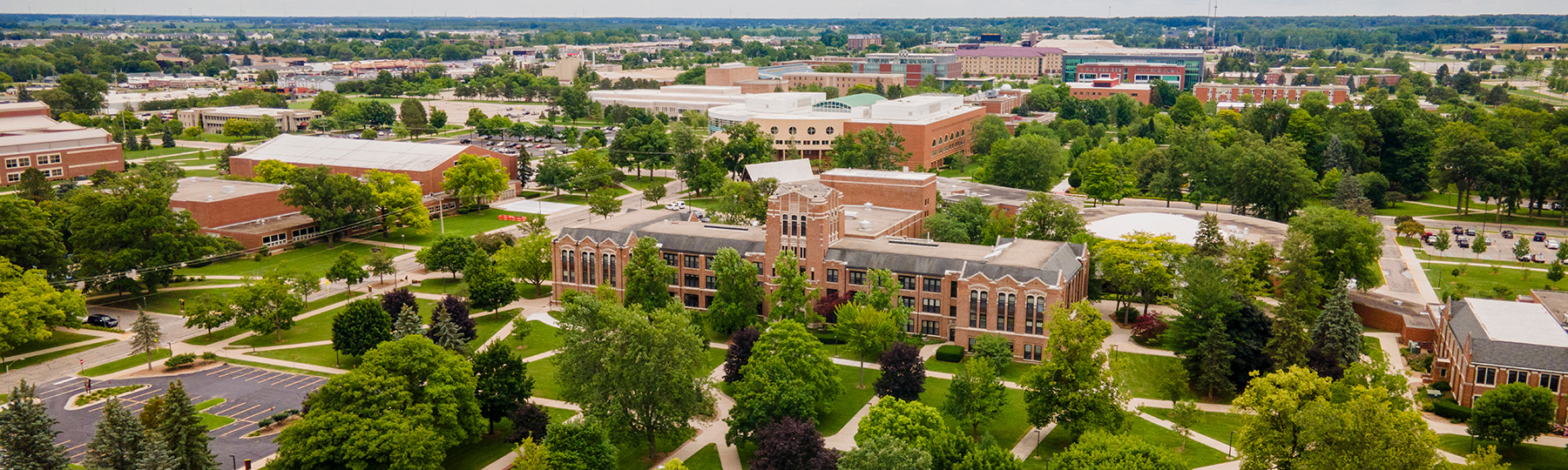 Drone image of campus featuring Warriner Hall.