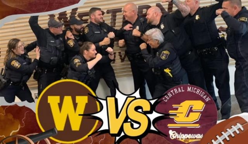 An image of police officers in uniform playfully posing as if they are against one another for rival week, promoting a food drive for Western Michigan University VS Central Michigan University.